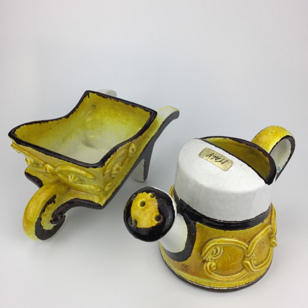 Ceramic yellow brown watering can wheelbarrow art